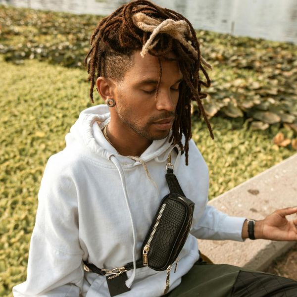 Person meditating calmly in a serene environment, symbolizing inner peace.